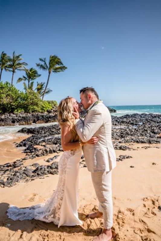 couple hugging on beach