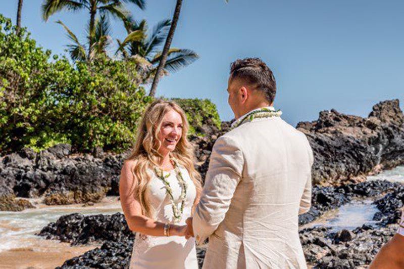 couple looking at each other on beach