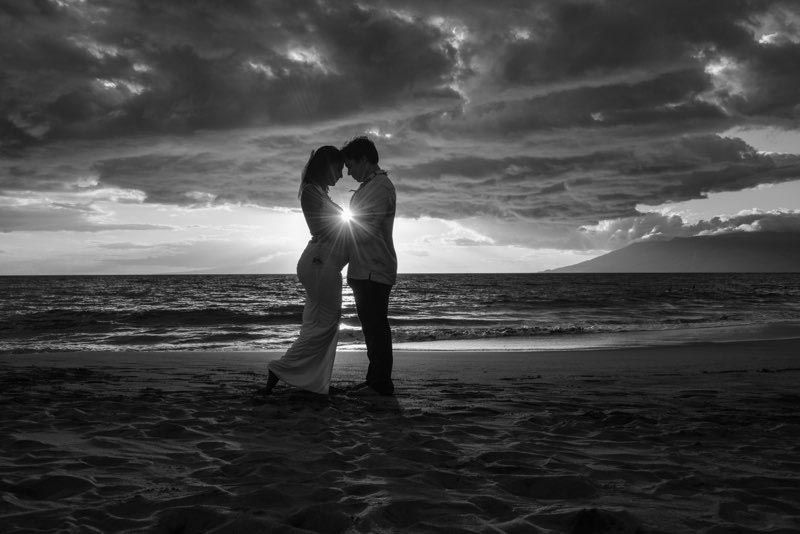 couple hugging on beach