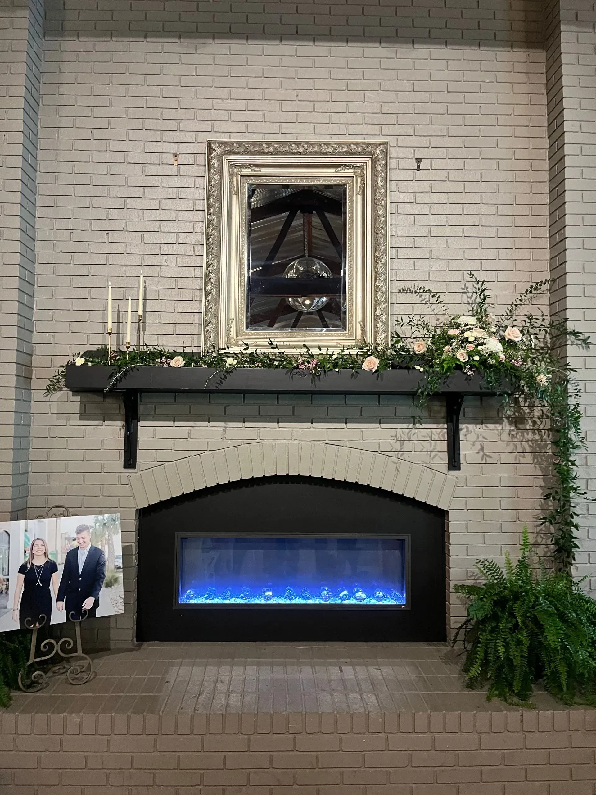 floral mantel piece at wedding venue