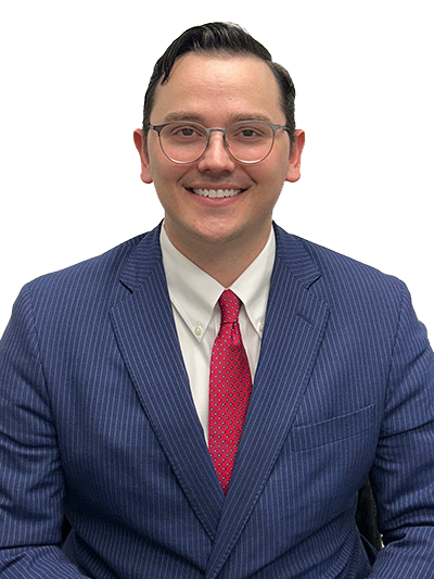Man in a blue pinstripe suit, red tie, and glasses smiling at the camera.