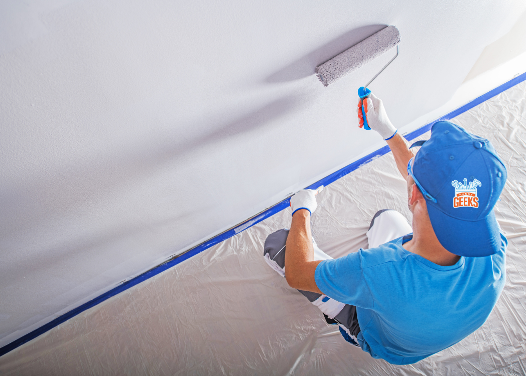 Chicago handyman repainting patched wall for smooth finish