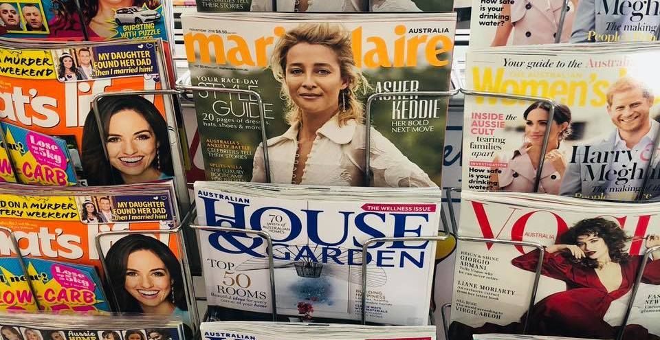 A Bunch Of Magazines Are Stacked On Top Of Each Other — Smith Street Supermarket In Darwin City, NT 