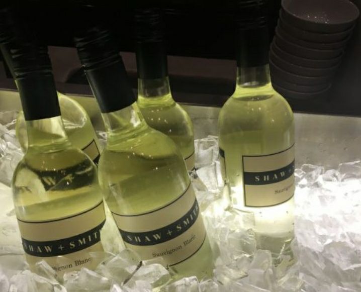 A Row Of Wine Bottles Lined Up On A Shelf — Smith Street Supermarket In Darwin City, NT