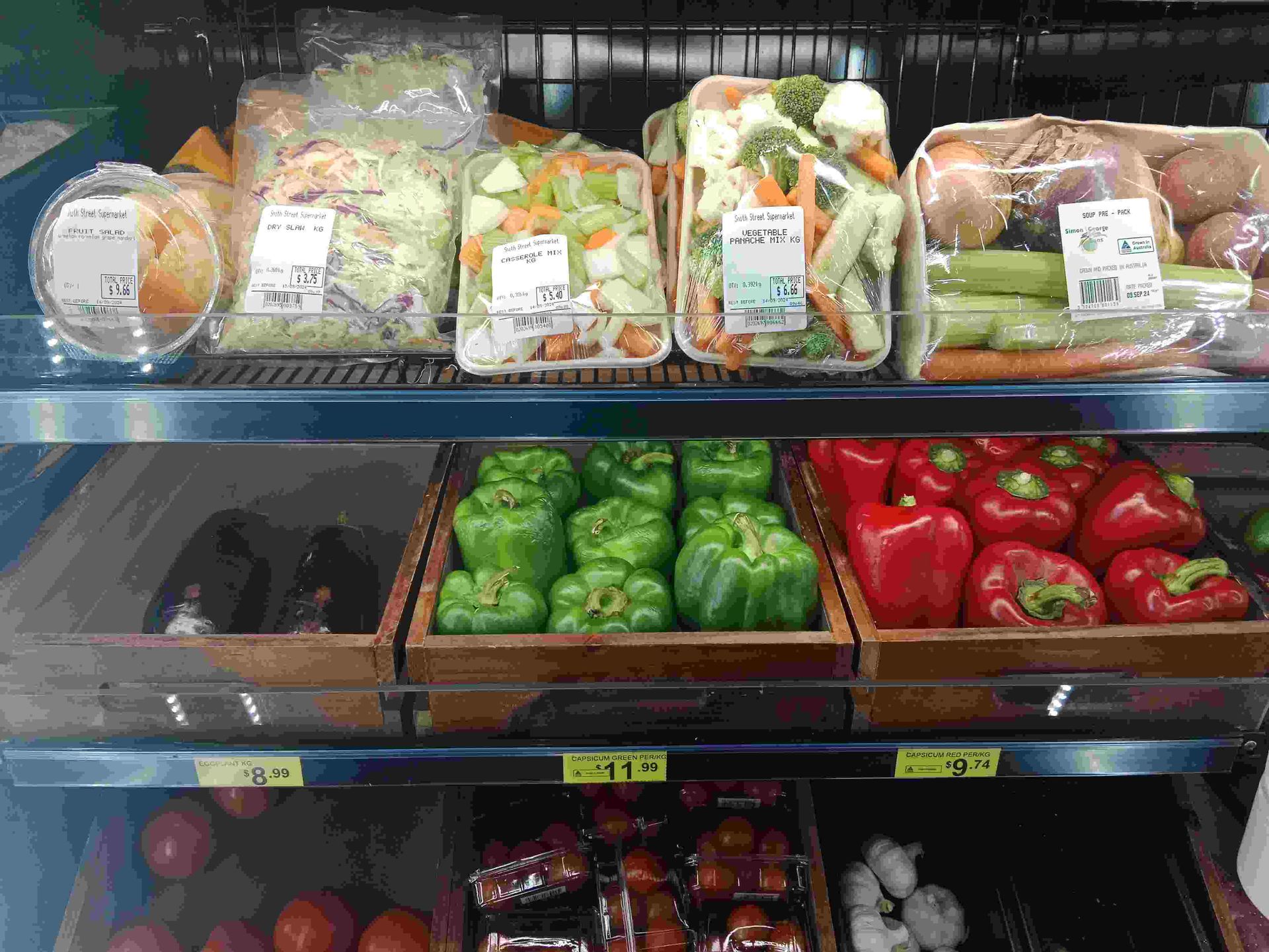 A Variety Of Vegetables Are Displayed On A Shelf In A Grocery Store — Smith Street Supermarket In Darwin City, NT 