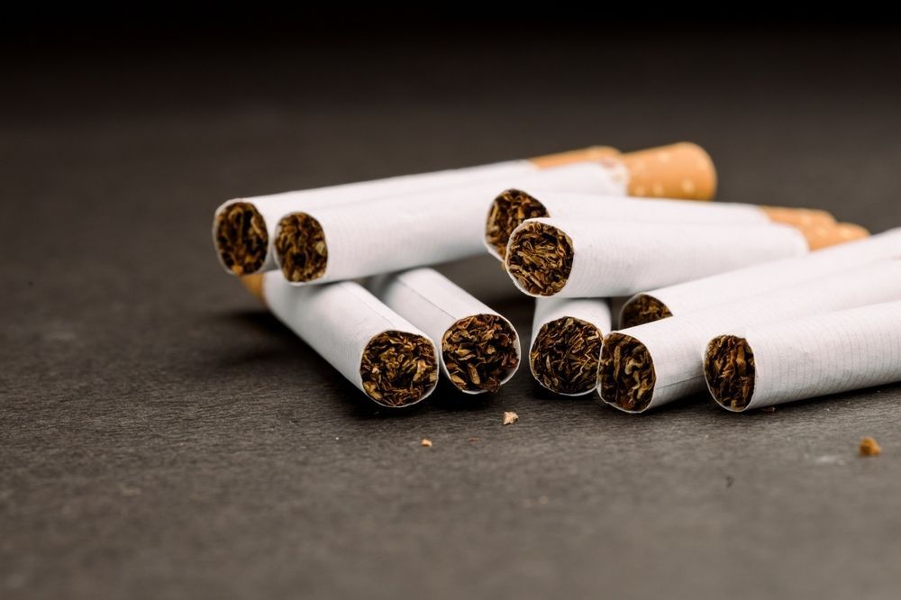 A Pile Of Cigarettes Sitting On Top Of Each Other On A Table — Smith Street Supermarket In Darwin City, NT 
