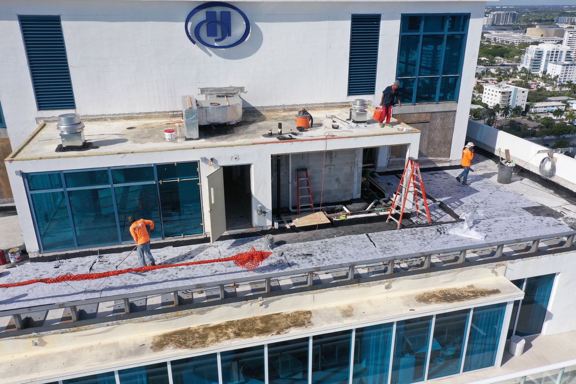 Looking up at a skyscraper with a blue sky in the background