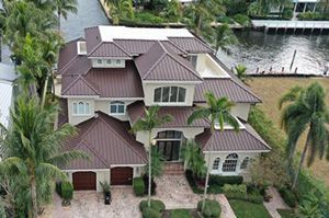 A close-up of a metal roof replacement