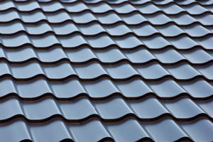 A row of metal tiles on a roof.