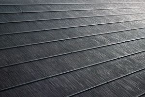 A row of rubber tiles on a roof.