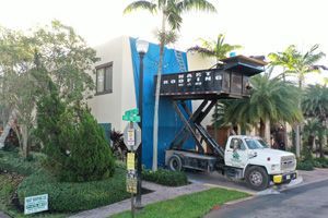 A close-up of a tile roof replacement