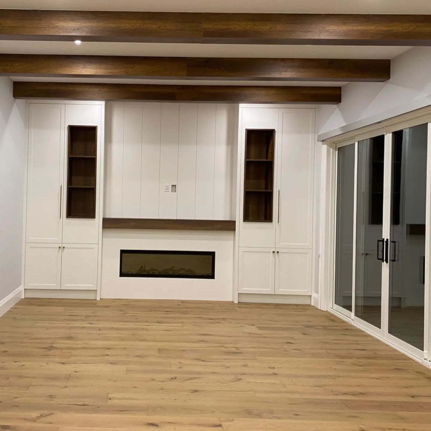 There is a fireplace in the middle of the room.