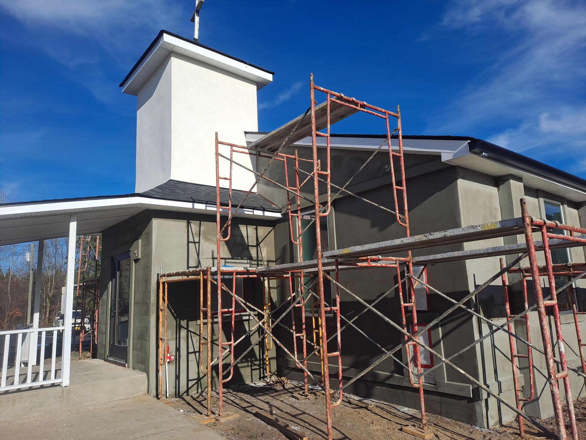A building under construction with scaffolding around it