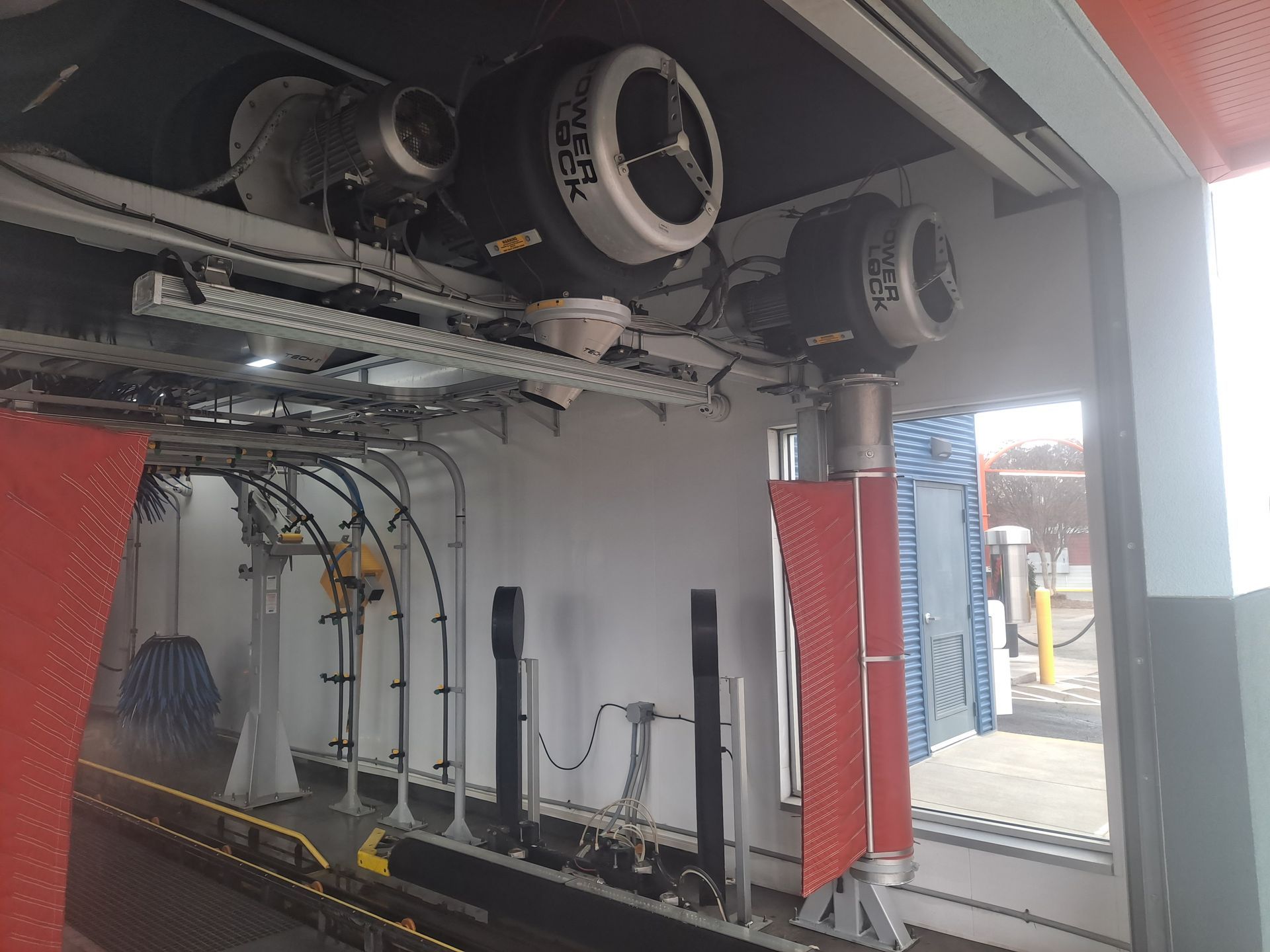A car wash with a lot of machinery in it