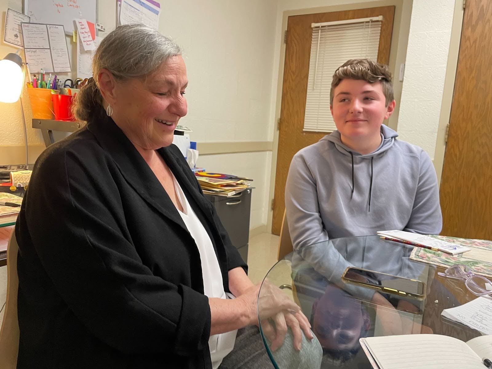 Jo Ann and Bill talk to Richard Dockett of Worcester Telegram and Gazette during their interview.