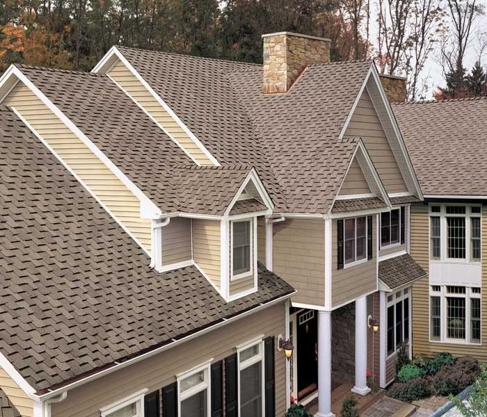 The roof of a house with a chimney on top of it