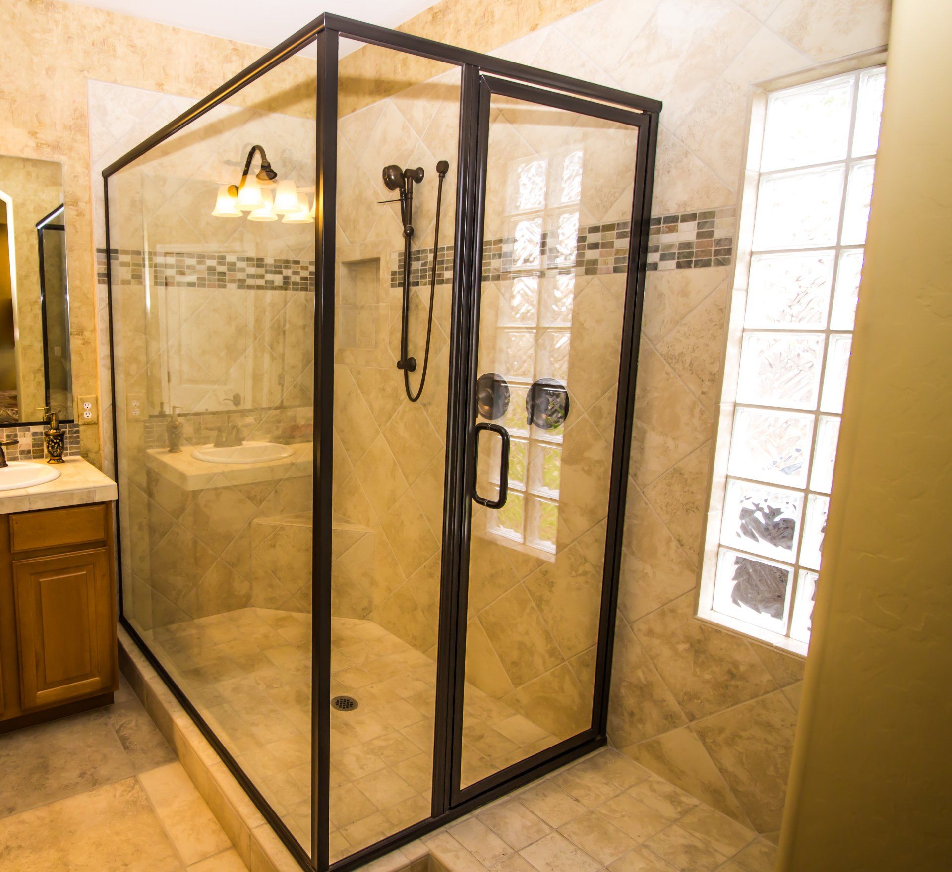 Glass shower enclosure