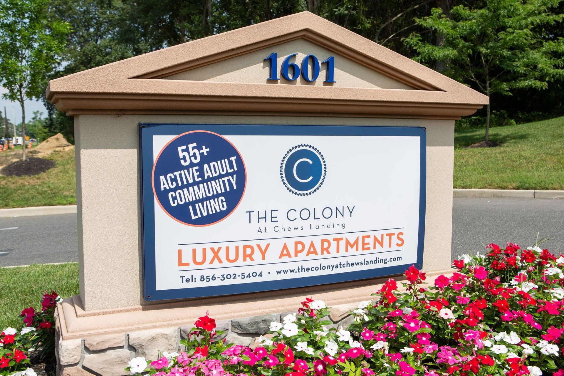 Monument sign for The Colony luxury apartments, 55+ active adult community.