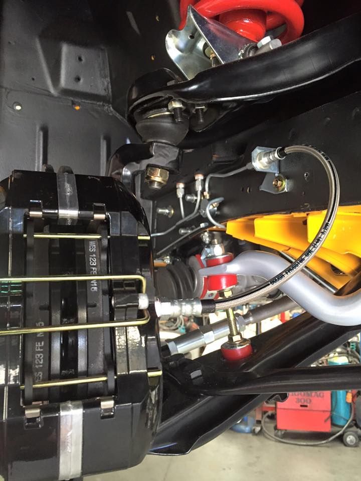 A close up of a brake system on a car