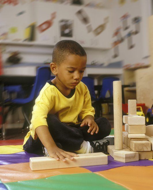 Child Playing With Blocks