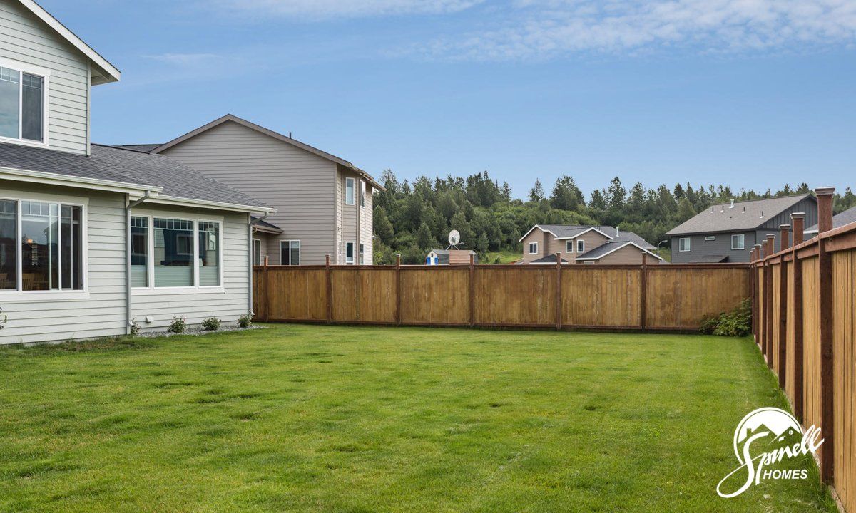 Spinell Homes | New Custom Homes | Anchorage Alaska | Outdoor Space | Backyard | Front Lawn | Wooden Deck | Patio