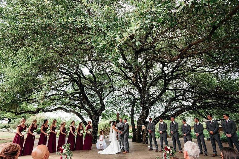 wedding being performed at Bella Oaks