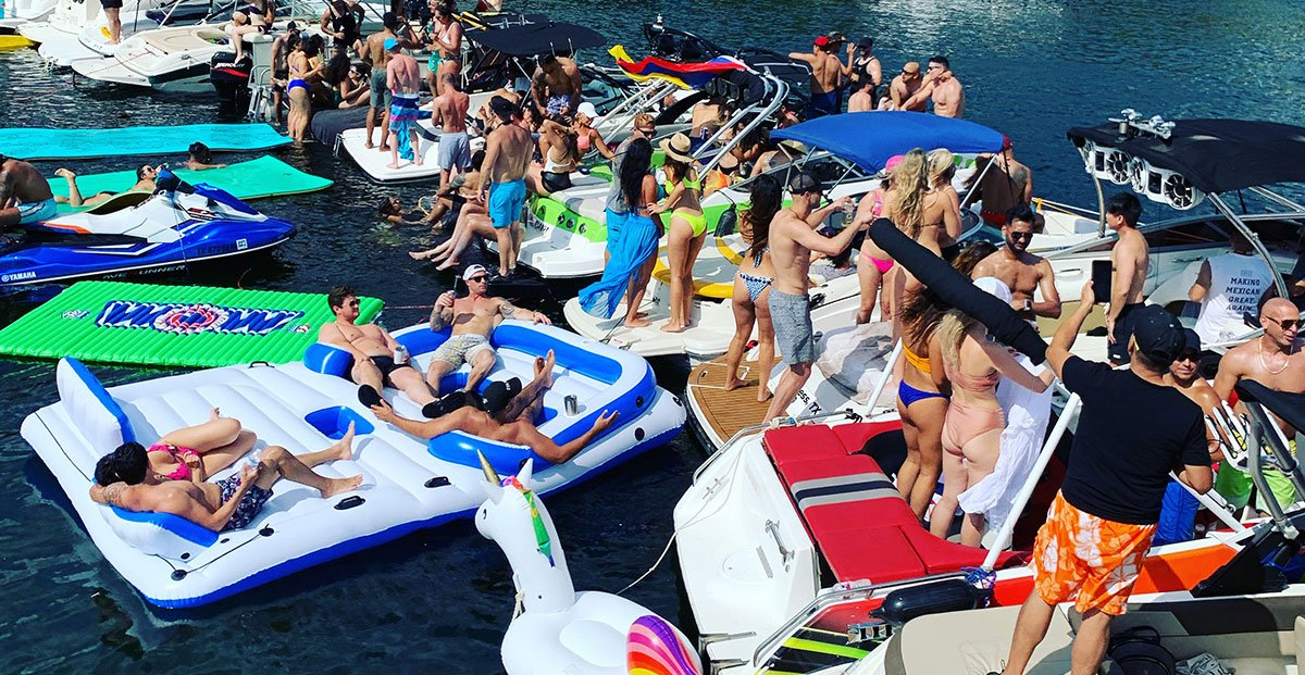 People in Austin, Texas, partying at Devil's Cove on Lake Travis.