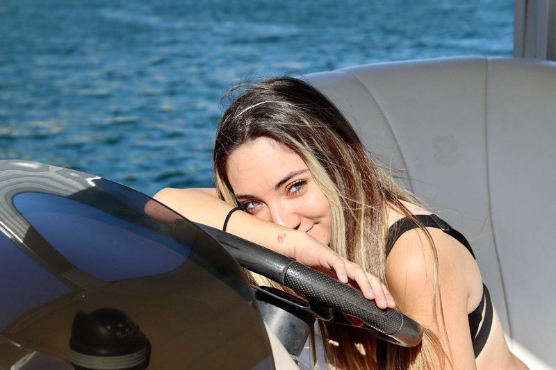 girl on a party boat during a romantic date in Lake Travis