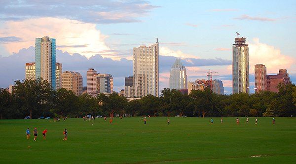 view of Zilker Park and the Downtown Austin skyline