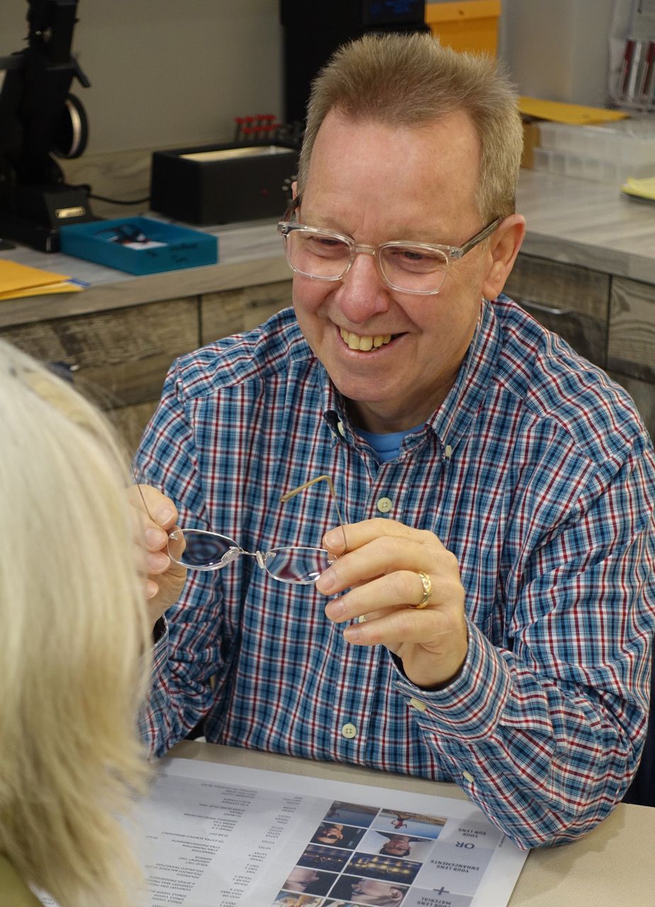 Optician Fitting Eyeglasses  — Midland, MI — Jackson & Bigelow, MD-PC