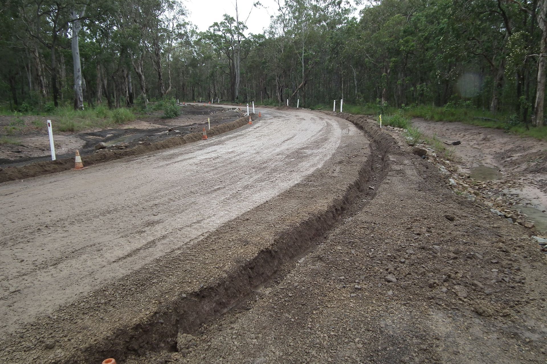Dirt Road Winding Through a Forest — Snell Earthworx In Craignish, QLD