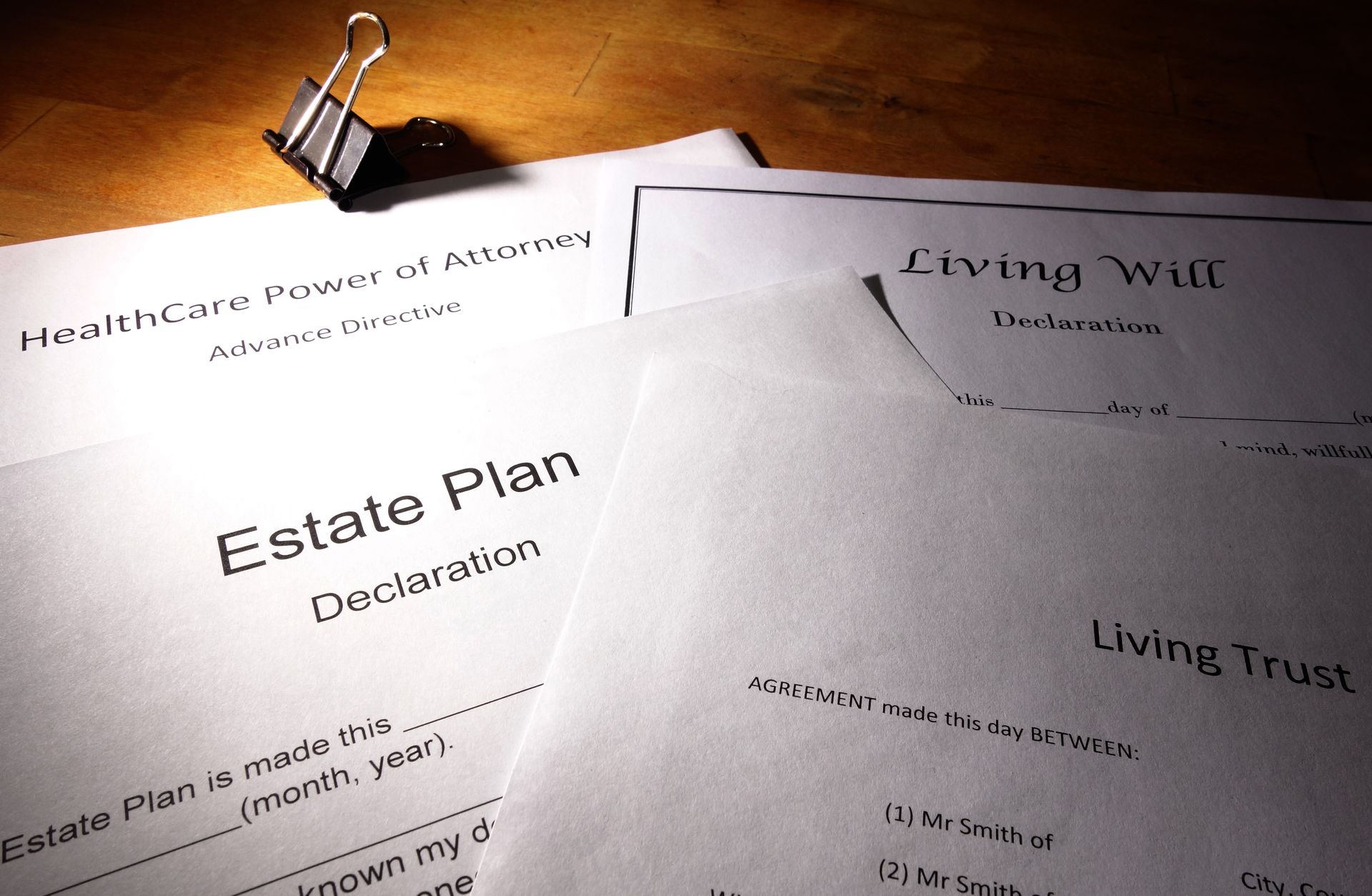 Several legal documents, including an Estate Plan, Living Trust, Living Will, and Health Care Power of Attorney.