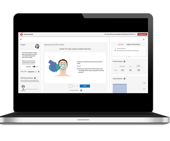 Laptop screen displaying a healthcare instructional video on using a mask. A person demonstrates mask placement.
