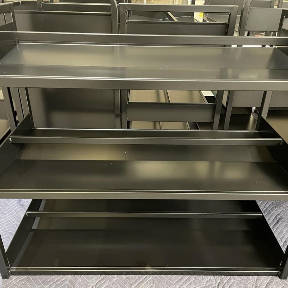 A Black Metal Shelf With Three Shelves — Border Security Doors & Powder Coating in Wodonga, VIC