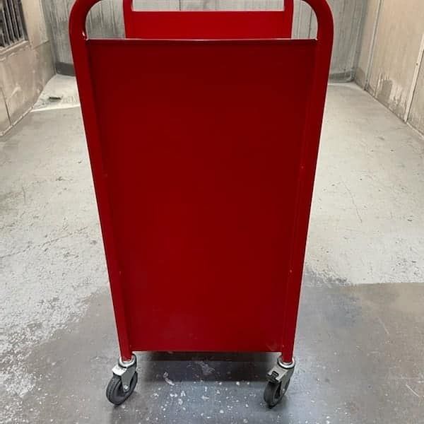A Red Cart With Wheels — Border Security Doors & Powder Coating in Wodonga, VIC