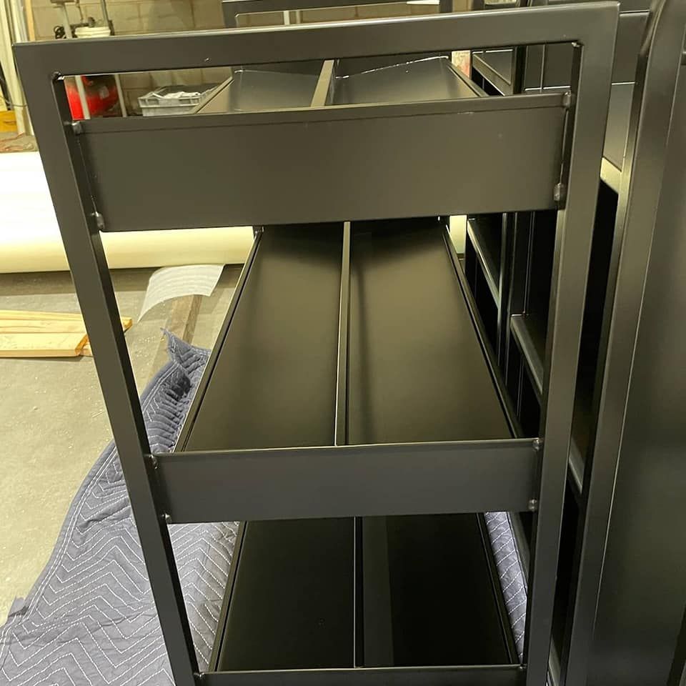 A Black Metal Shelf — Border Security Doors & Powder Coating in Wodonga, VIC
