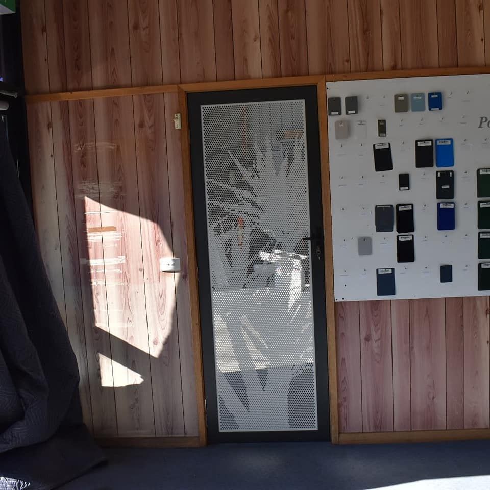 Wooden Wall with Secure Door — Border Security Doors & Powder Coating in Wodonga, VIC