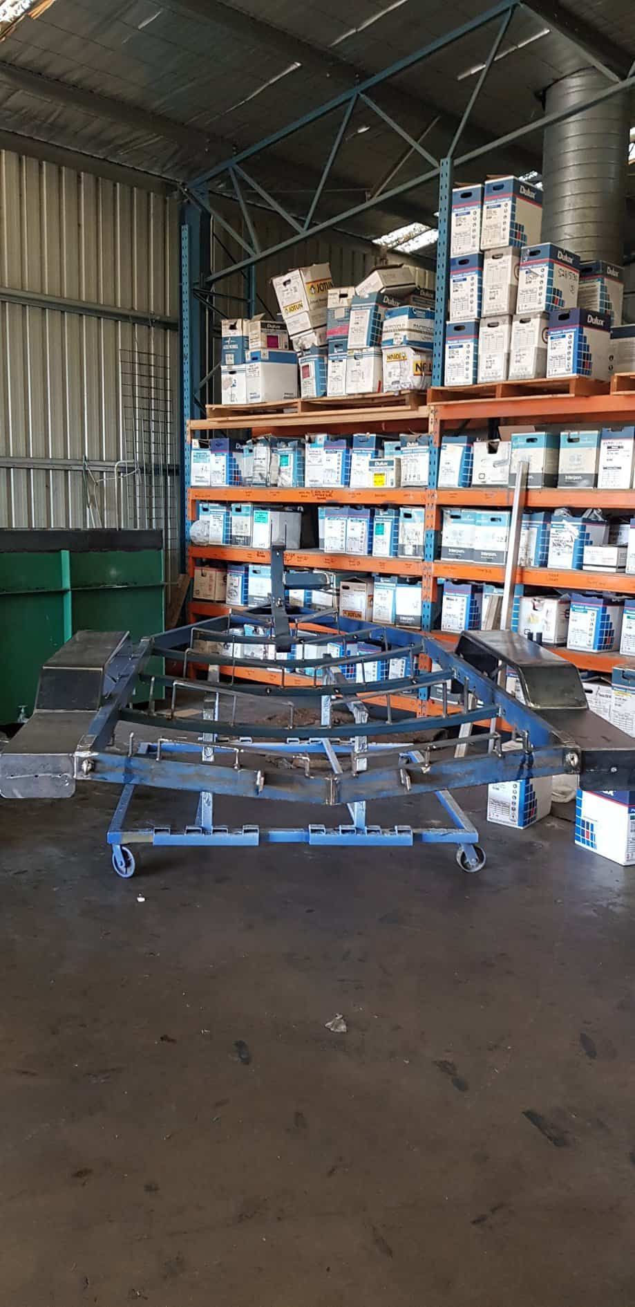 A Warehouse Filled With Lots Of Boxes — Border Security Doors & Powder Coating in Wodonga, VIC