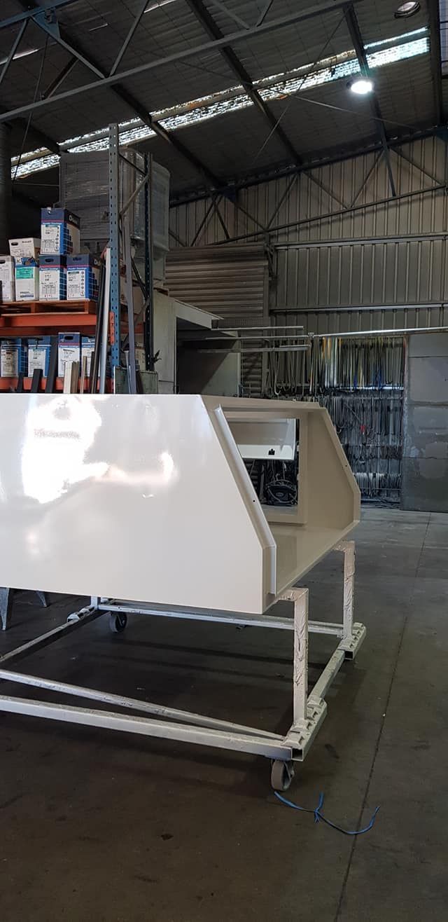 A Large White Box Is Sitting On Top Of A Cart — Border Security Doors & Powder Coating in Wodonga, VIC