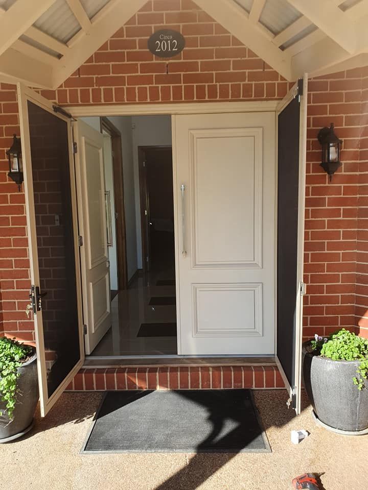 Another Front Door Of A Brick House — Border Security Doors & Powder Coating in Wodonga, VIC