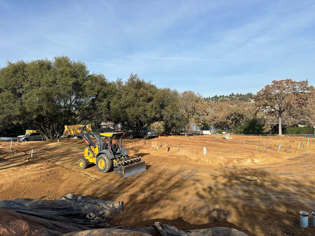 Workers digging footings and crawlspace