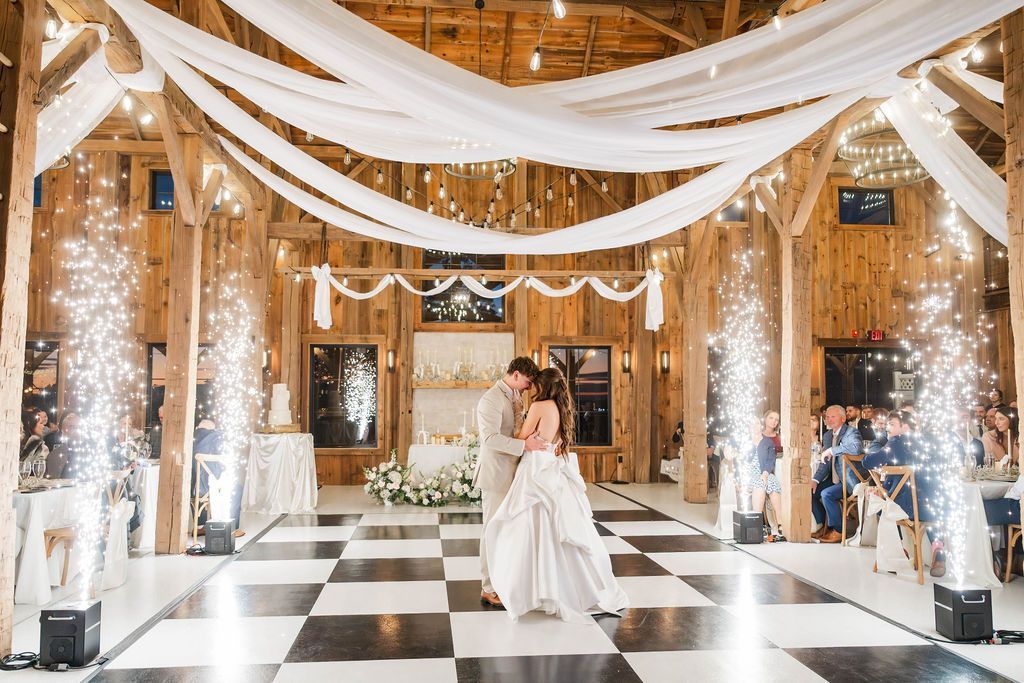 Spacious, light-filled wooden barn interior with a glossy white floor near Waynesburg, PA, Uniontown, PA, Point Marion, PA