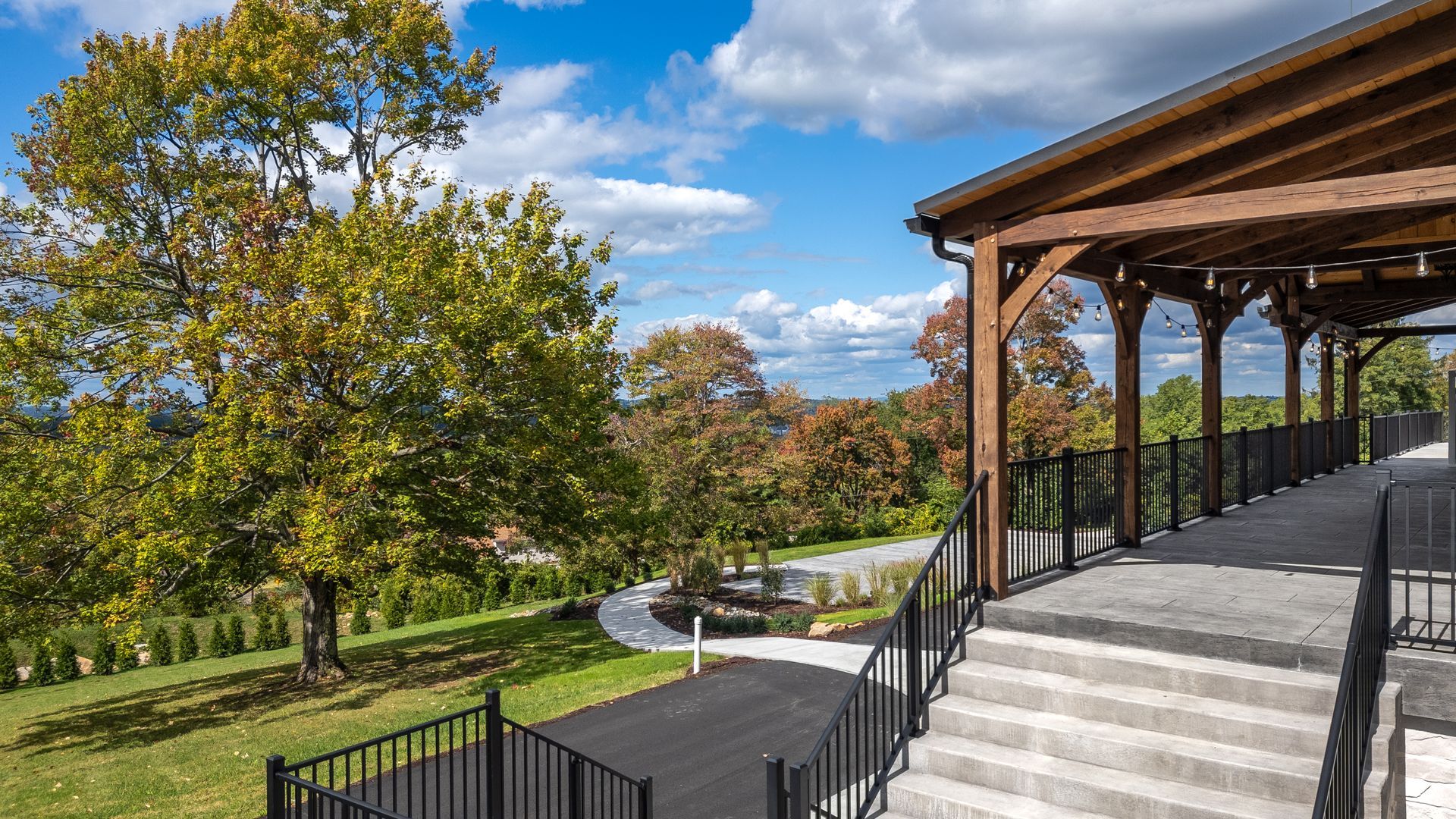 A wooden pavilion at White Oak 1838, Morgantown West Virginia. Reclaimed Antique Barn Wedding Venue. 