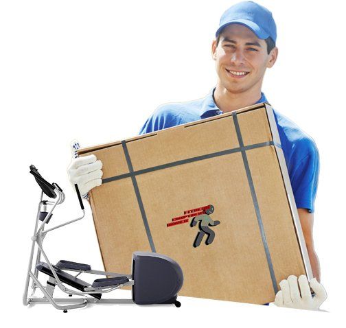 a man in a blue shirt is holding a large cardboard box that says ' t.t.t. ' on it