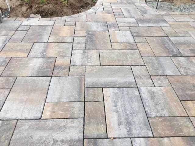 A patio with a lot of tiles on it