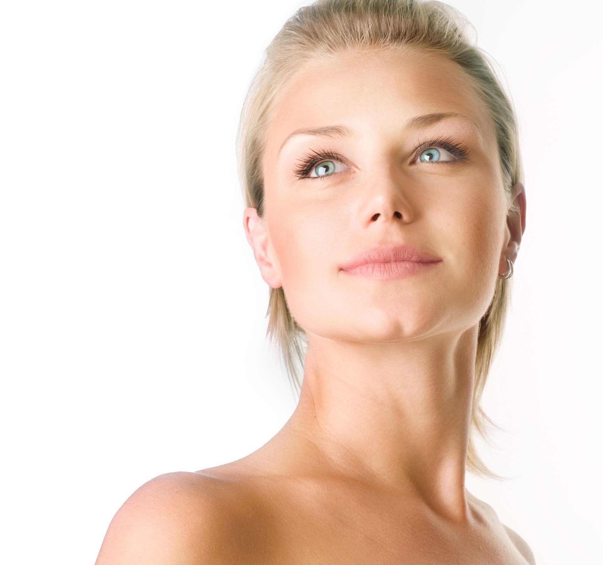 a close up of a woman 's face with a white background .