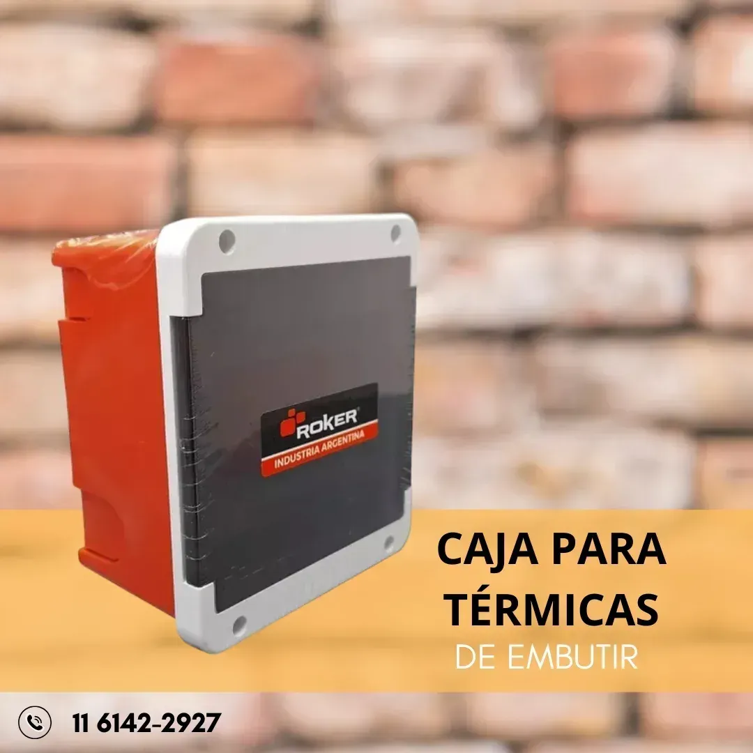 Red and black embedded electrical box against a brick wall. Text: 