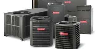 Collection of Goodman HVAC units, various sizes and types, in black with red Goodman logos.