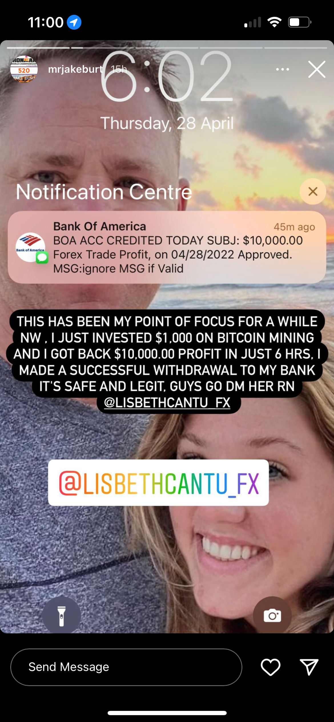 A man and a woman are smiling on a cell phone screen.