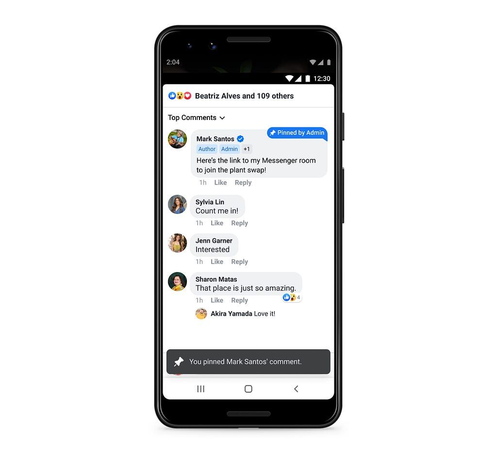 A cell phone with a facebook page open on it.
